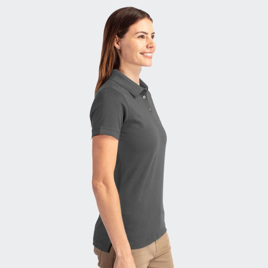 A women's polo shirt in a dark grey colour, featuring a collar and a logo on the chest.