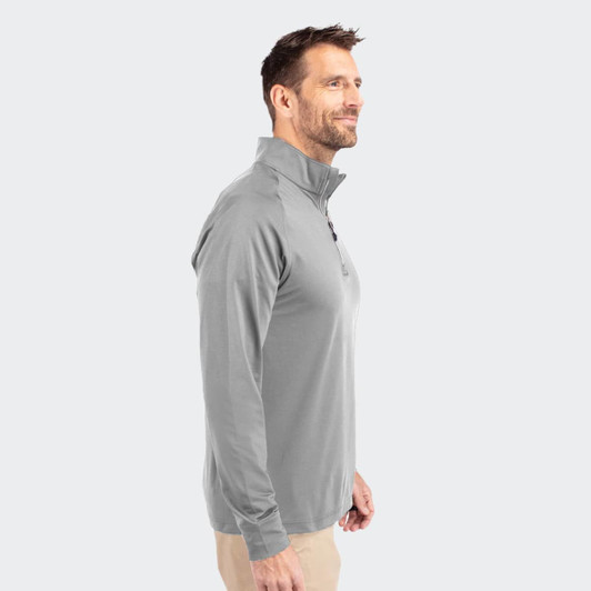 A grey men's half zip top with a collar, featuring long sleeves and a side profile view.