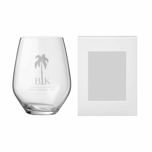 Premium stemless wine glass featuring a palm tree design, alongside a white gift box for presentation.
