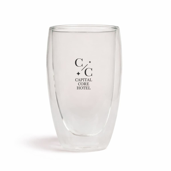 A double wall glass cup in clear with a logo on the front, designed for hot and cold beverages.