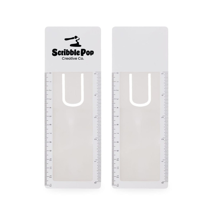 A translucent white bookmark magnifier ruler with a logo, featuring measurement markings on one side.
