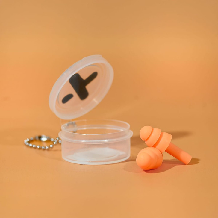 An orange silicone earplug set in a clear case with a keychain attachment. The case lid is open.