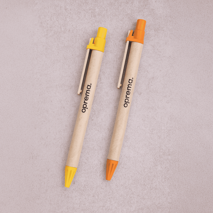 Two wooden pens in yellow and orange with a brand logo on each.
