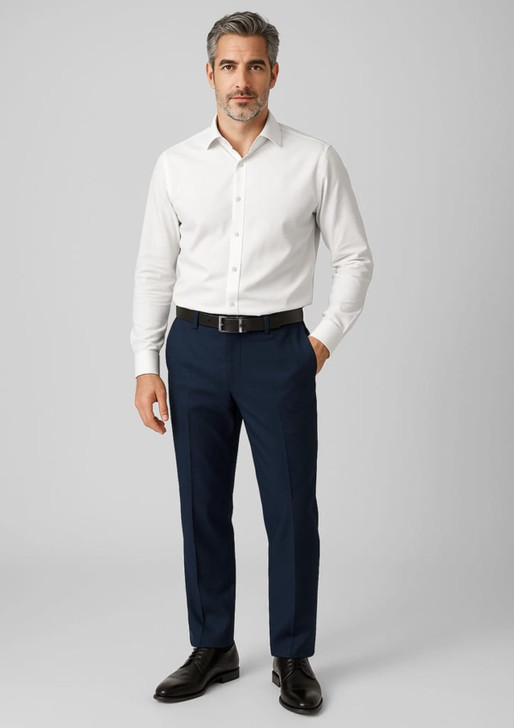 A man wearing a white shirt and navy wool stretch adjustable waist pants, complemented by black shoes. The pants have a logo.