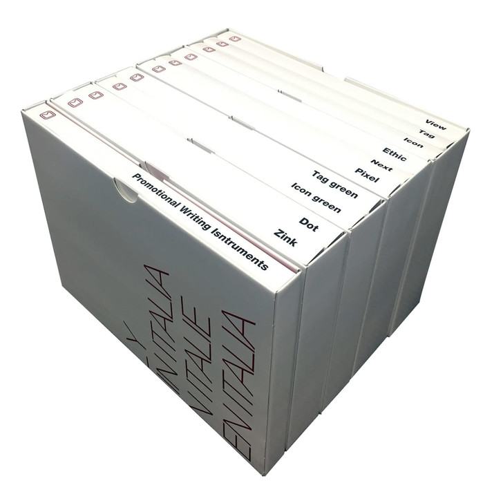 A white box containing several compartments for different writing instruments, labelled with various pen names.