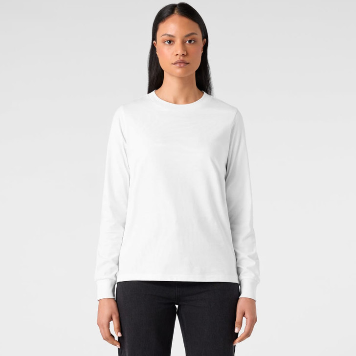 A long-sleeve white T-shirt featuring a logo, styled with a simple design and paired with black jeans.