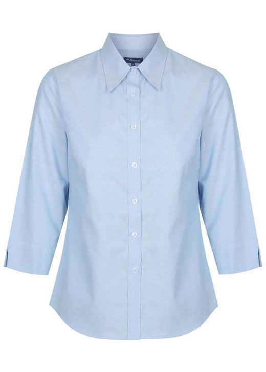 A light blue button-up shirt with long sleeves and a collar. Features a logo on the side.