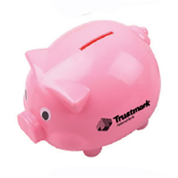 A pink pig-shaped coin bank with a slot for coins and a logo on the side.