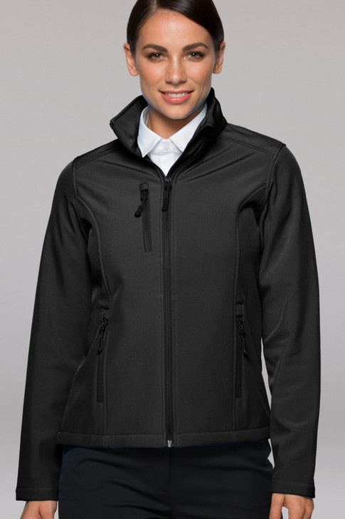 A soft shell jacket in black, featuring a zippered front and two side pockets, modelled by a woman.