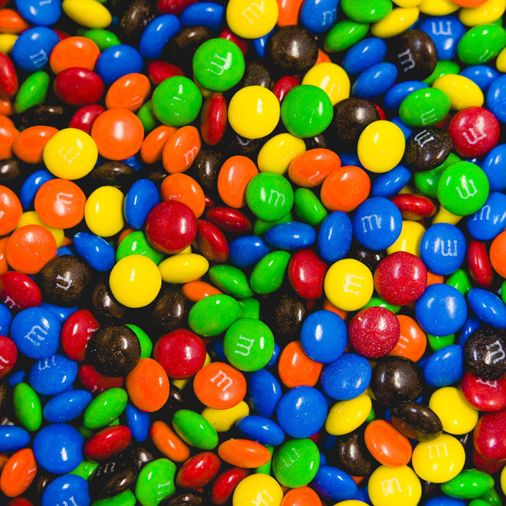 A mix of assorted colour M&M's, featuring blue, green, red, yellow, orange, and black choc beans.