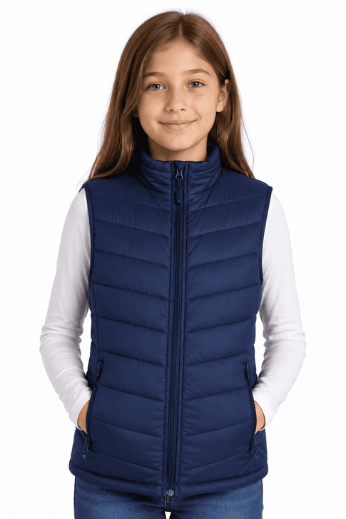 A navy blue padded vest for children, featuring a zip front and side pockets, worn by a girl.
