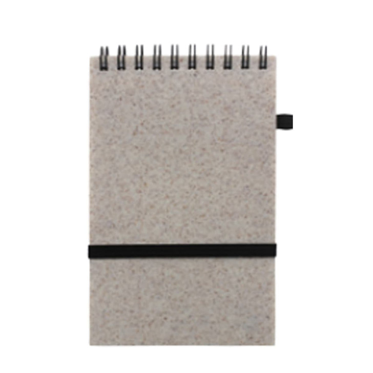 A6 notebook made from recycled coffee grounds, featuring a brown and beige textured cover and a black elastic band.