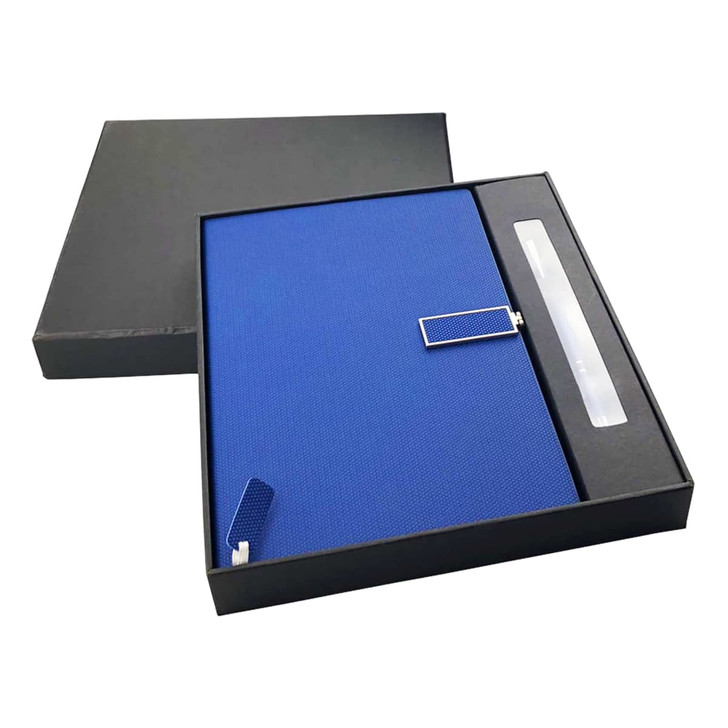 A blue notebook and pen set in a black gift box, featuring a stylish design and a logo.
