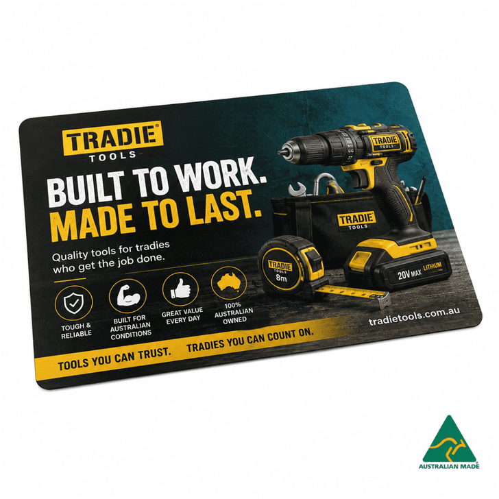 A promotional mouse mat featuring a black and yellow power drill, with a logo and various tool images on a textured background.