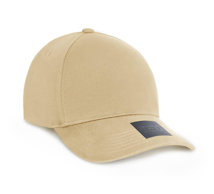 A beige cotton/spandex cap with a curved visor and a logo on the side.