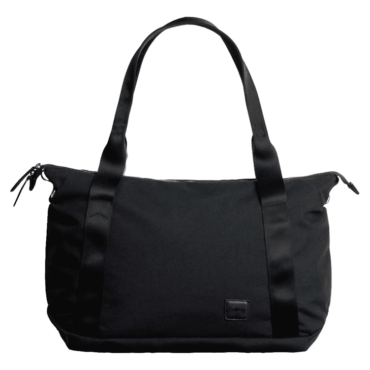 A black tote bag with two sturdy handles, featuring a sleek design and a logo.