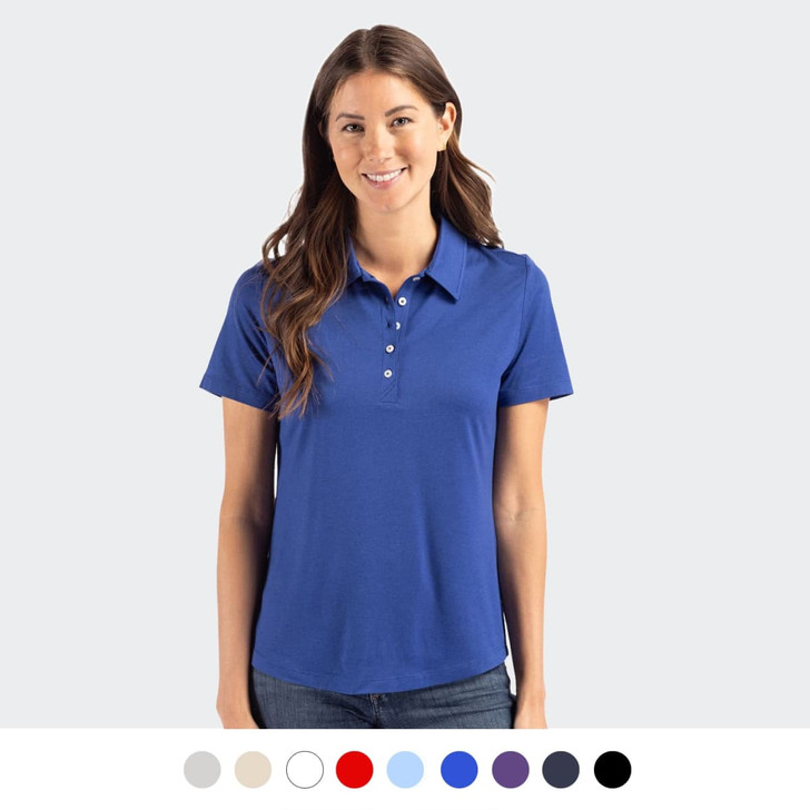 A woman wearing a blue polo shirt with a collar and buttons, featuring a logo on the chest. Multiple colour options below.