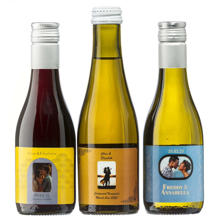A trio of 200mL sparkling wine bottles, featuring a mix of red and white varieties, each with unique labels and branding.