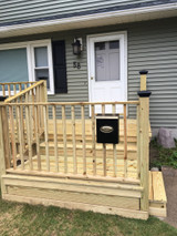 black pyramid four by four post caps on a residential deck