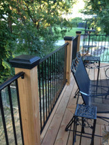 Six by six Black Flat Top Post Cap for wooden posts on deck.  6x6 Atlanta Post Caps being used on customer's deck