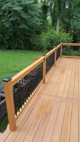 Four by four black Aluminum Post Cap on a residential deck