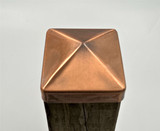 Top View of a 4x4 Copper Plated Post Cap on a 3.5" wood post.