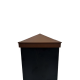 front view of a brown 6x6 metal post caps on a black metal post