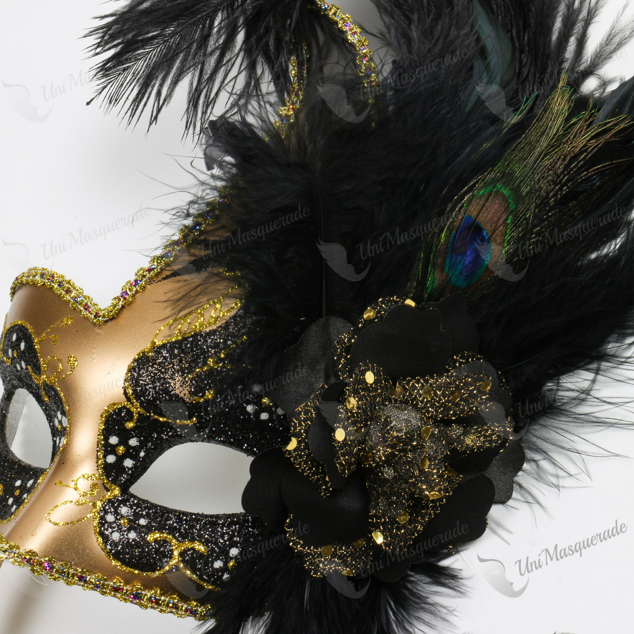 female masquerade masks on a stick