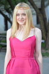 Dakota Fanning wows in pink number and adorable headpiece