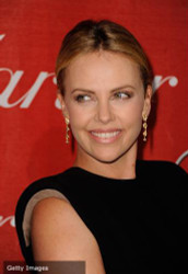 Charlize Theron stands out in bright green at Variety Impact Awards