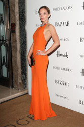 Emily Blunt dazzles in tangerine frock