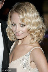 Nicole Richie looks stunning in cream-colored dress