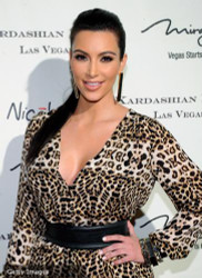 Kim Kardashian brings out her animal instincts at store opening