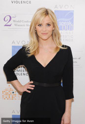 Reese Witherspoon rocks the perfect black dress for Avon Communication Awards