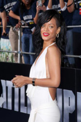 Rihanna wows in white drape dress for Battleship premiere