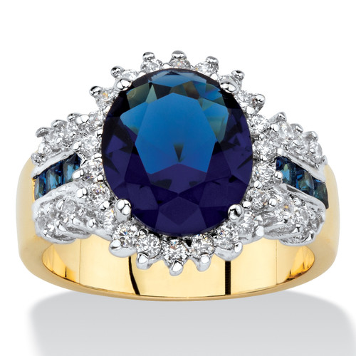 Oval-Cut Simulated Blue Sapphire and White Cubic Zirconia Halo Cocktail Ring 7.64 TCW Yellow Gold-Plated