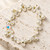 Round Aurora Borealis Crystal and Simulated Pearl Stretch Bracelet 7"