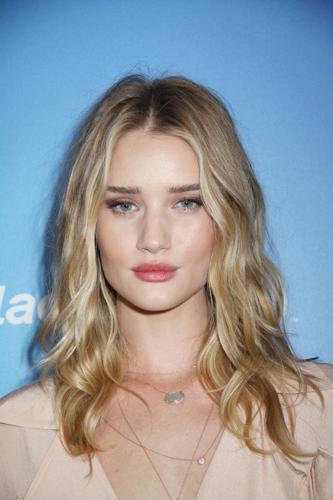 Rosie Huntington-Whiteley steps out wearing an upper arm bangle ...