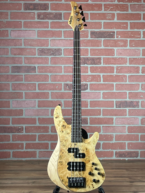 Premium Schecter Reaper-4 bass with Darkglass Tone Capsule, USA M-40 pickups, and figured poplar burl top. Innovative bass design. No Limit Guitar Co, Idaho Falls.