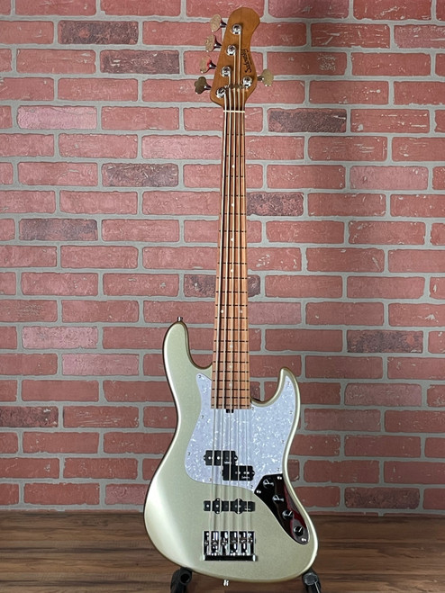 Premium Sadowsky MetroExpress Hybrid P/J 5-string bass with Champagne Metallic finish, roasted maple, and active electronics. Professional versatility. No Limit Guitar Co, Idaho Falls.