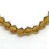 4mm Glass Bicone beads - AMBER - approx 16-18" strand (110-120 beads)