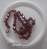 Strand of glass bicone beads - approx 6mm, Plum Lustered, approx 52 beads