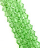 Strand of glass bicone beads - approx 6mm, PALE GREEN, approx 52 beads