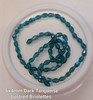 Strand of faceted drop glass beads (briolettes) - approx 6x4mm, Dark Turquoise Lustered , approx 72 beads