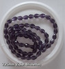 Strand of faceted drop glass beads (briolettes) - approx 7x5mm, Violet, approx 70 beads