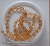 Strand of faceted drop glass beads (briolettes) - approx 7x5mm, Gold, approx 70 beads