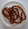 Strand of faceted drop glass beads (briolettes) - approx 7x5mm, Brown, approx 70 beads