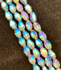 Strand of faceted rice glass beads - approx 6x4mm, Grey AB / Blue Metallic, approx 72 beads