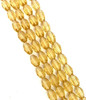 Strand of faceted rice glass beads - approx 6x4mm, Pale Gold, approx 72 beads
