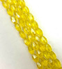 Strand of faceted rice glass beads - approx 6x4mm, Yellow, approx 72 beads